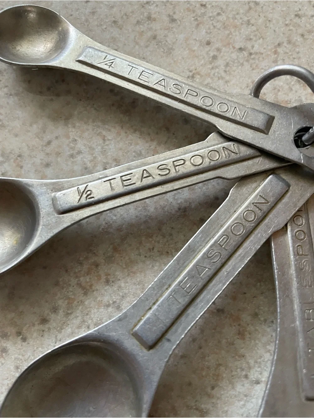 Vintage U.S.ST'D Aluminum Metal Measuring Spoons Oval Nesting Set of 4 on Ring